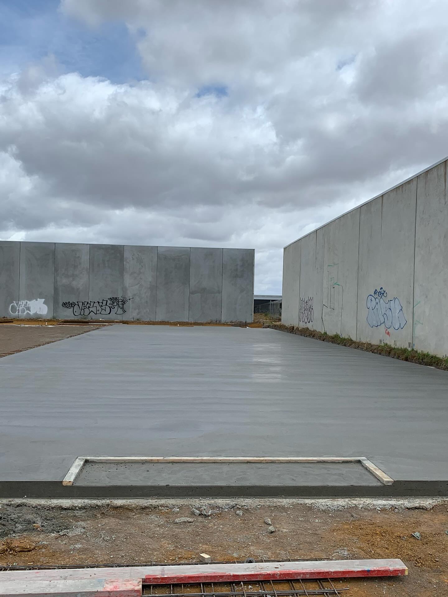Steel reinforcement laid and concrete poured for a raft slab in Geelong