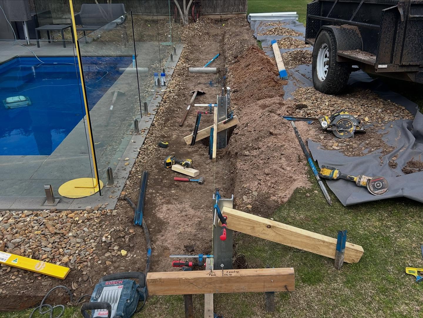 Tiered multi-level concrete retaining walls on a steep block
